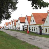 Walking around original village houses, Holašovice, Czech Republic
