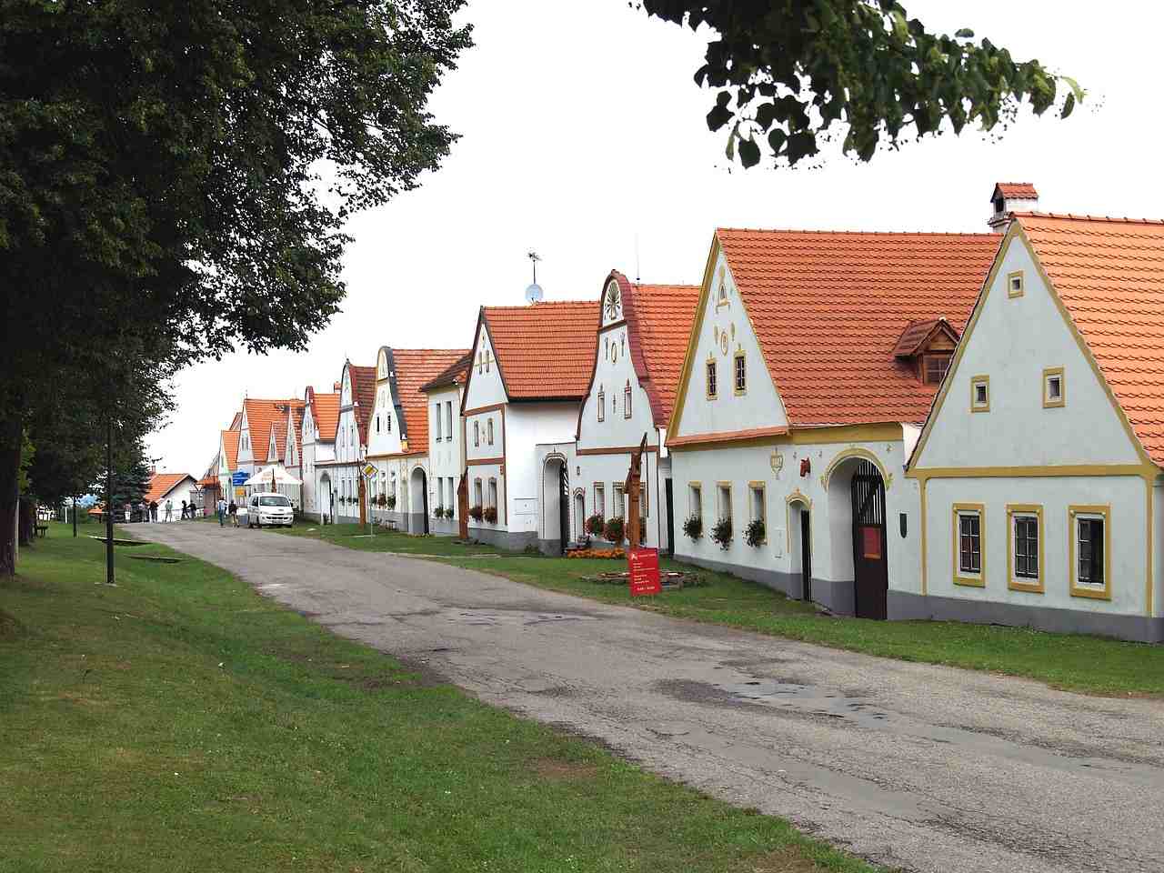 Walking around original village houses, Holašovice, Czech Republic