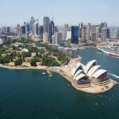 View of Sydney Opera house from the air and city skyline