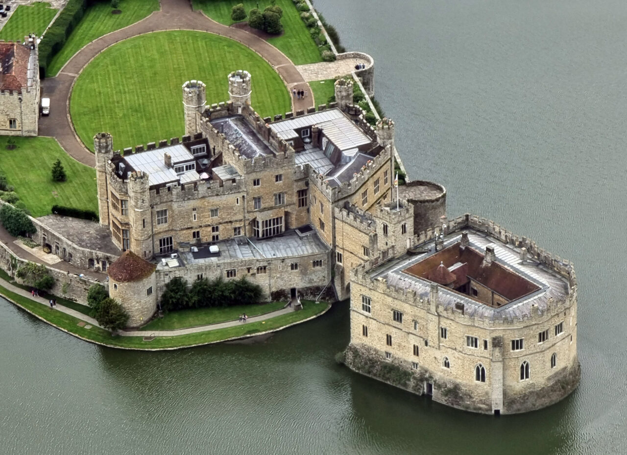 Drone view of the Leeds Castle surrounded by water in Broomfield, England